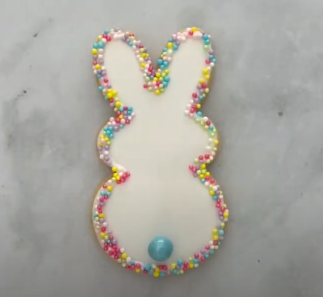 Image of a white bunny cookie decorated with sprinkles