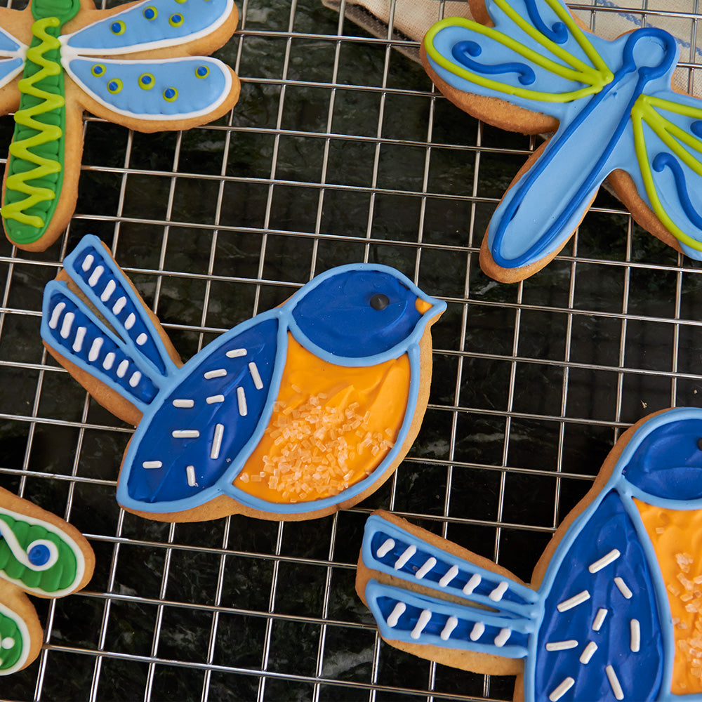 Blue bird cookie on a cooling rack