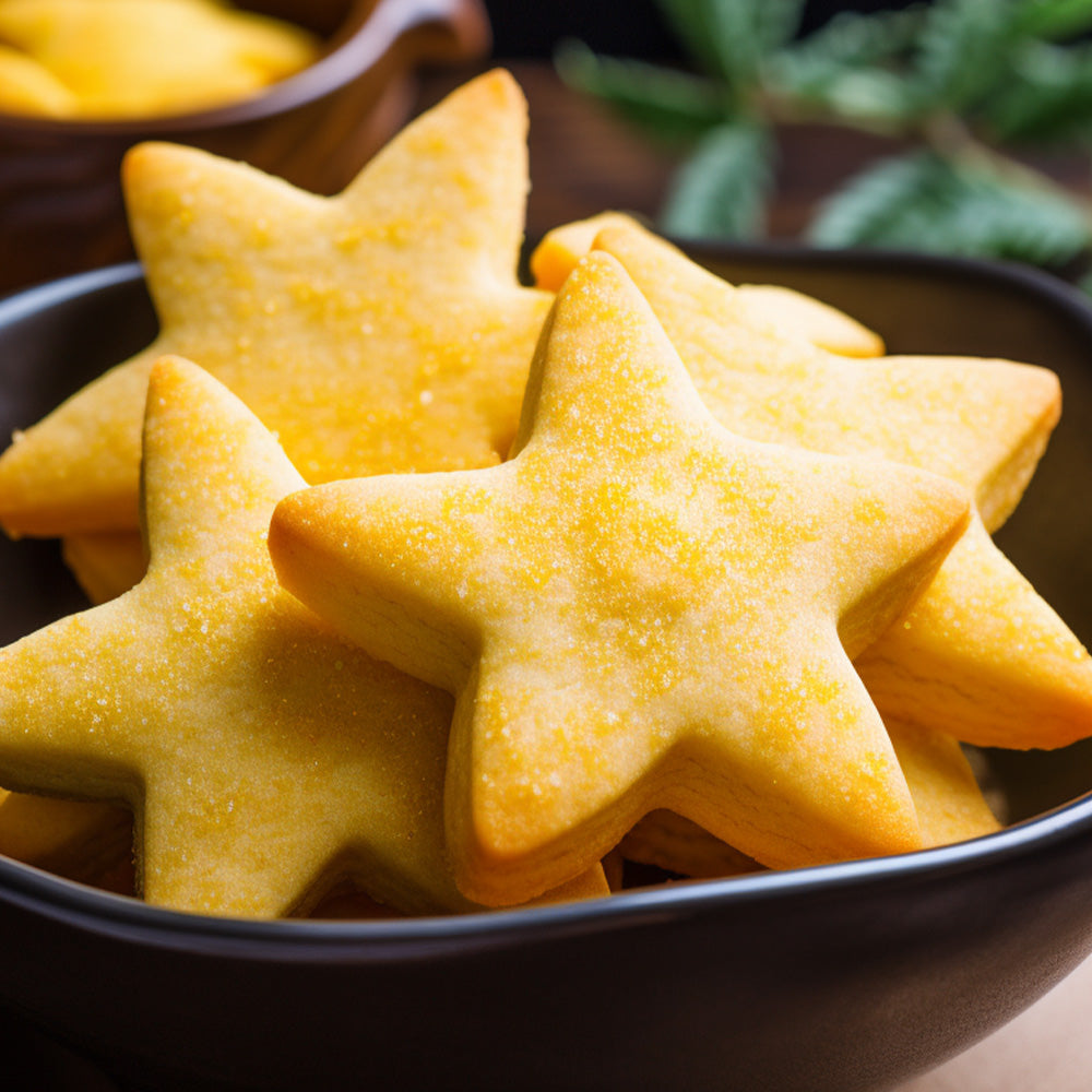 star shaped cornmeal cookies in a shallow bowl