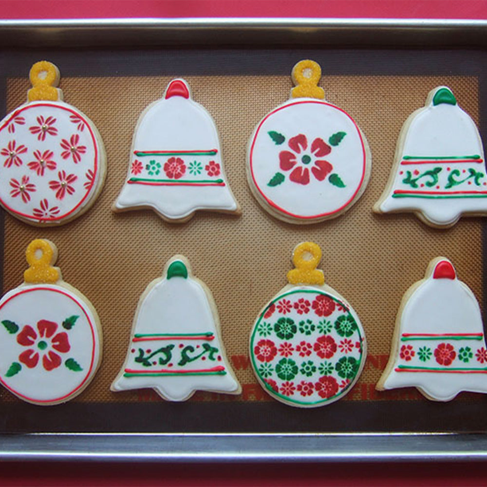 Christmas cookies decorated and on a tray