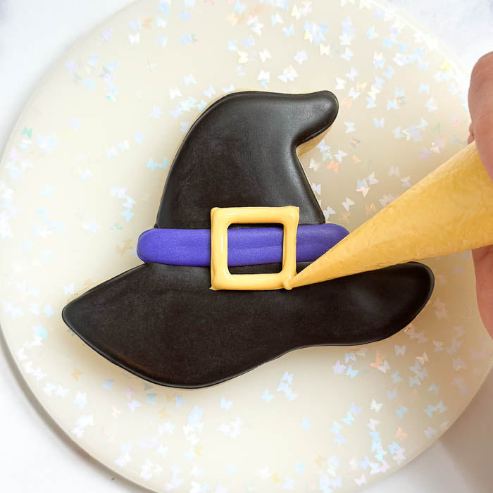 Decorating a Witch Hat Cookie for Halloween