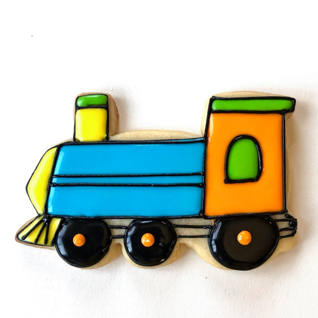 Image of a train sugar cookie decorated with colorful royal icing