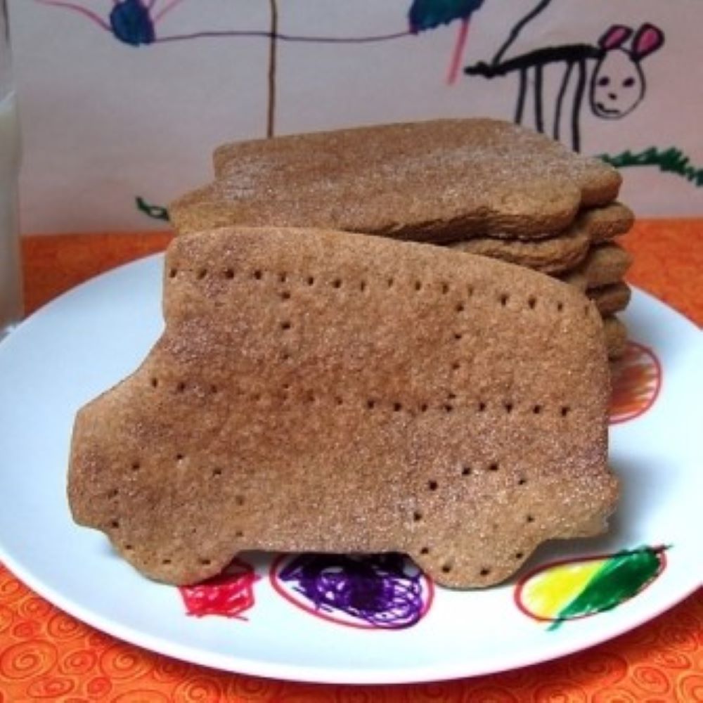 graham crackers shapes like a school bus on a plate