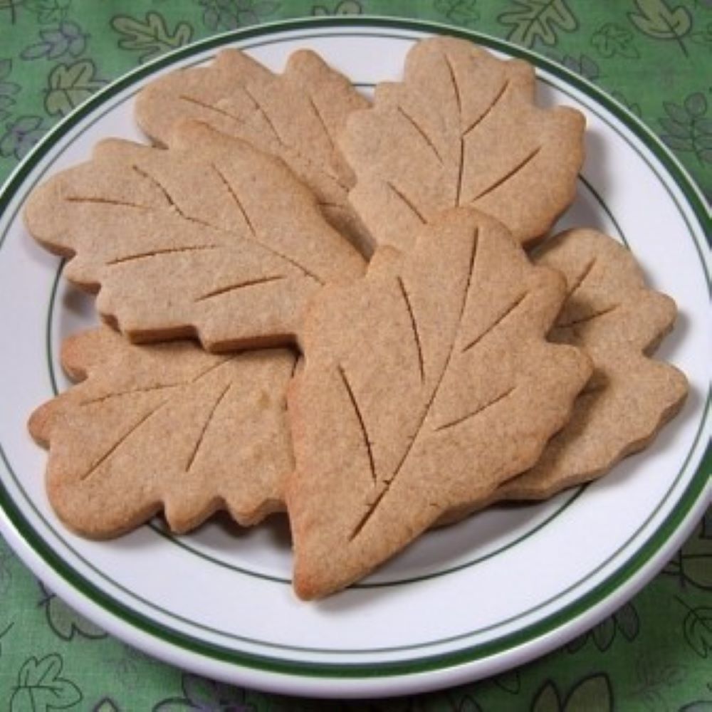 leaf shaped rye cookies on a white plate
