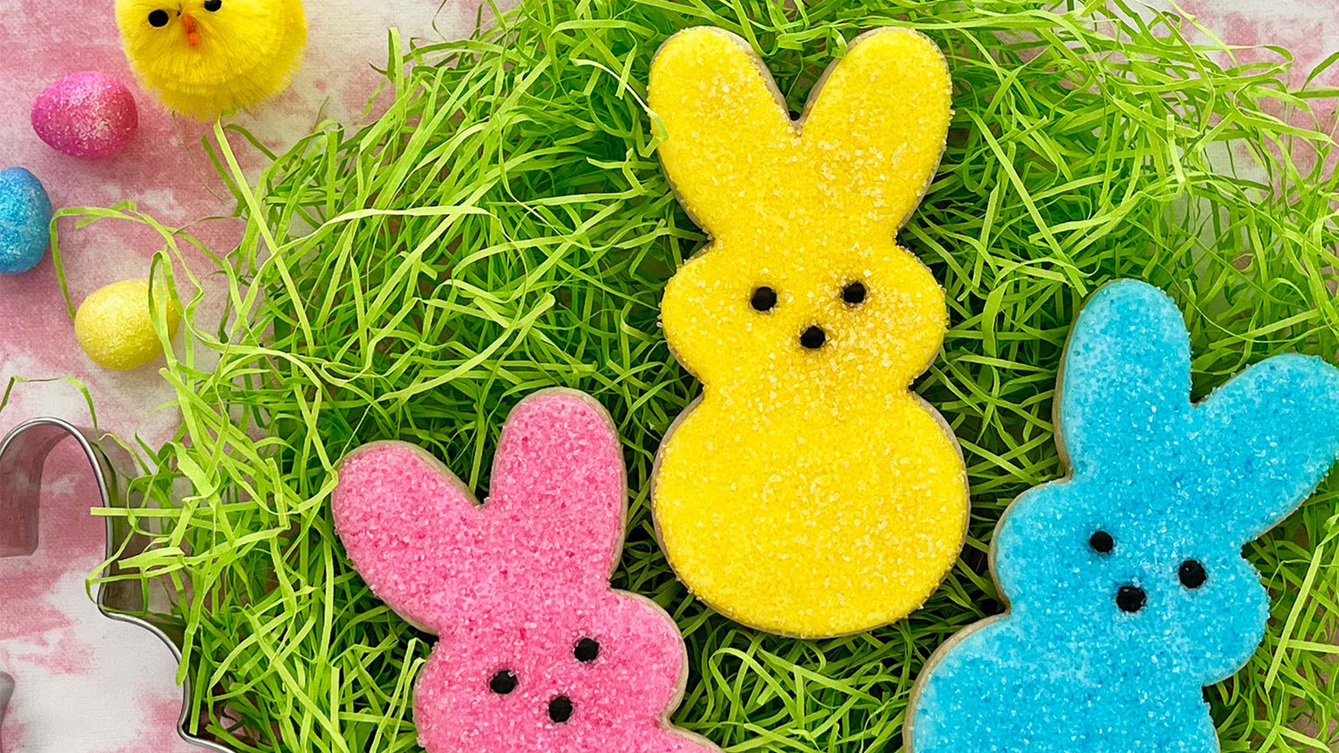 Bunny cookies on a background of fake grass