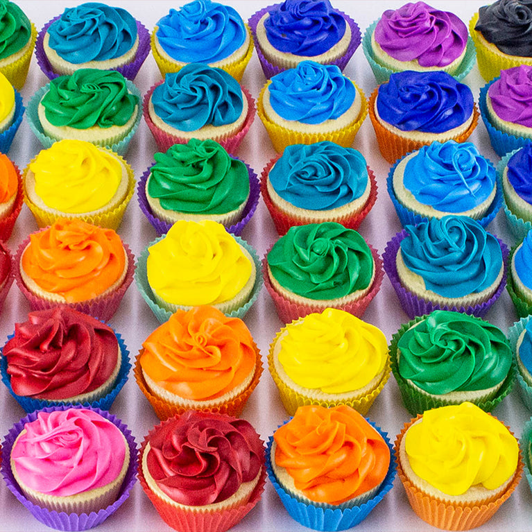 Cupcakes with varying vibrant colored frosting