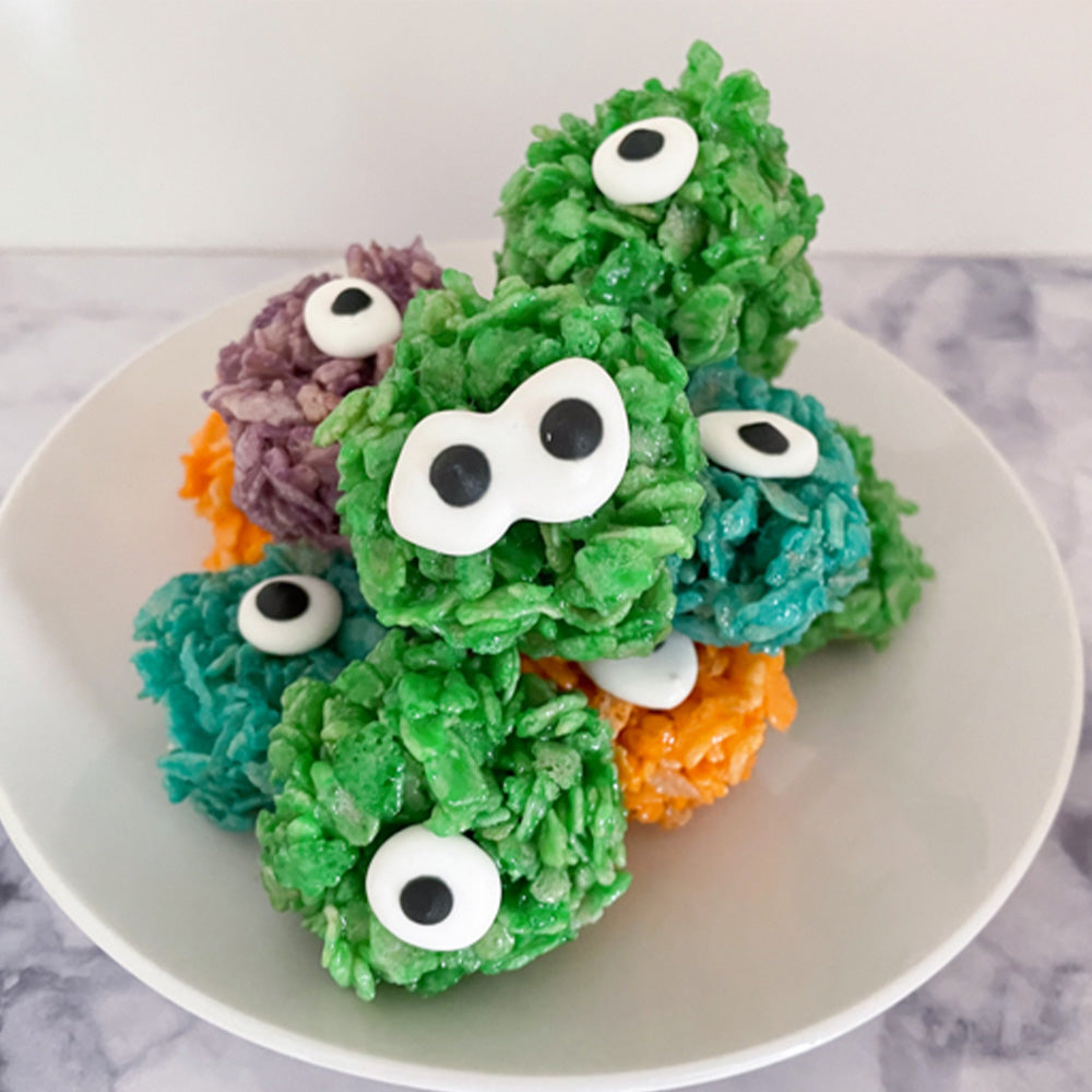 Colorful rice crispie treats shaped like eyeballs for Halloween